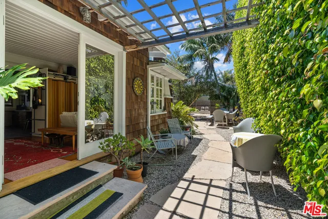 a building outdoor space with patio furniture