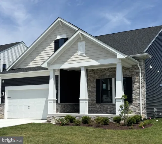 a front view of house with a yard