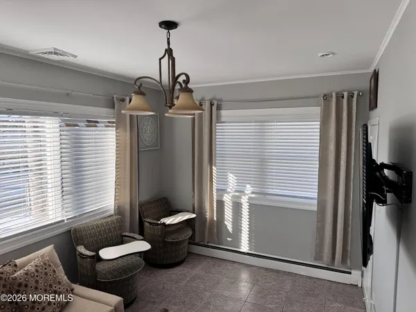 a room with furniture and window