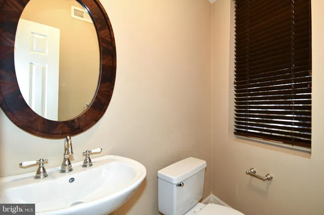 a kitchen with a sink and a stove