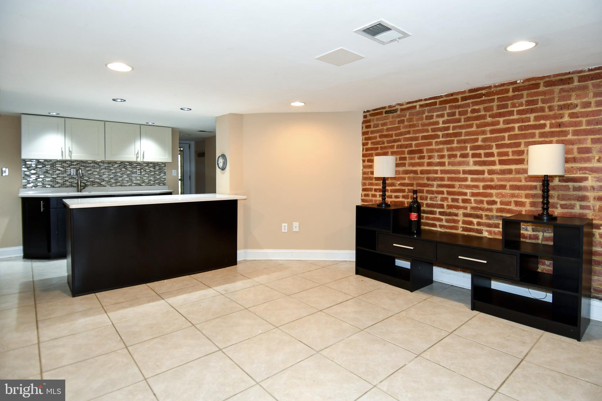 11 R Street Northwest Washington, DC 20001 - Photo 36 of 55 a bathroom with a sink and a mirror