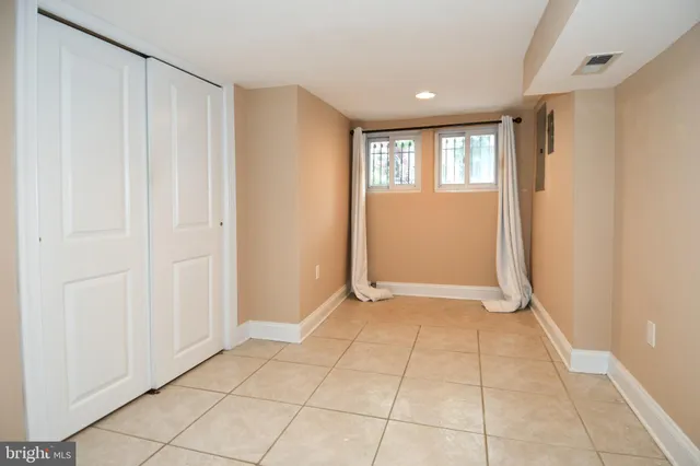 a view of a building with sitting area