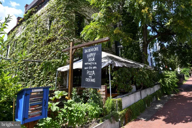 a view of a building with a street