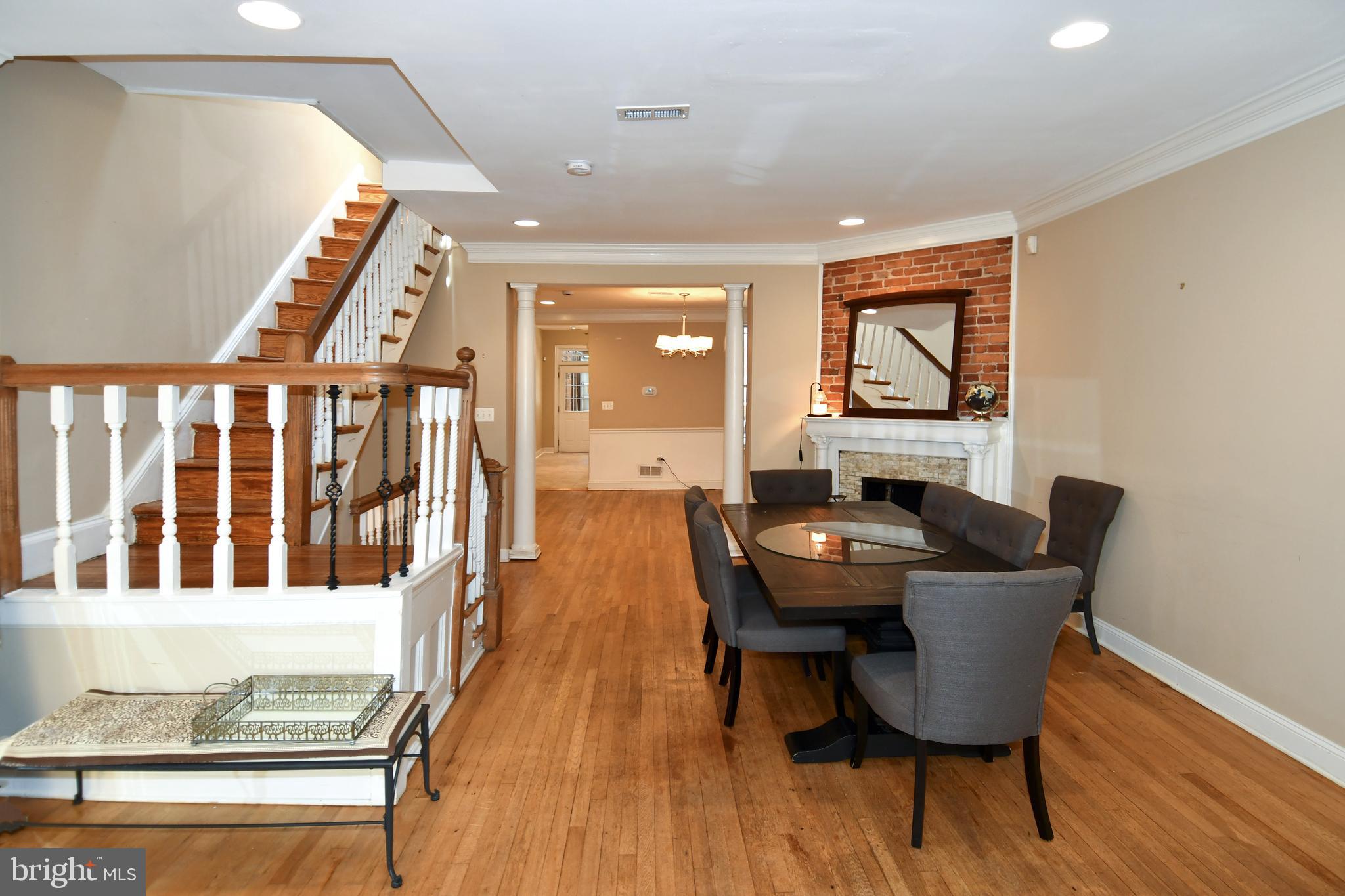 11 R Street Northwest Washington, DC 20001 - Photo 6 of 55 a dining room with furniture and wooden floor