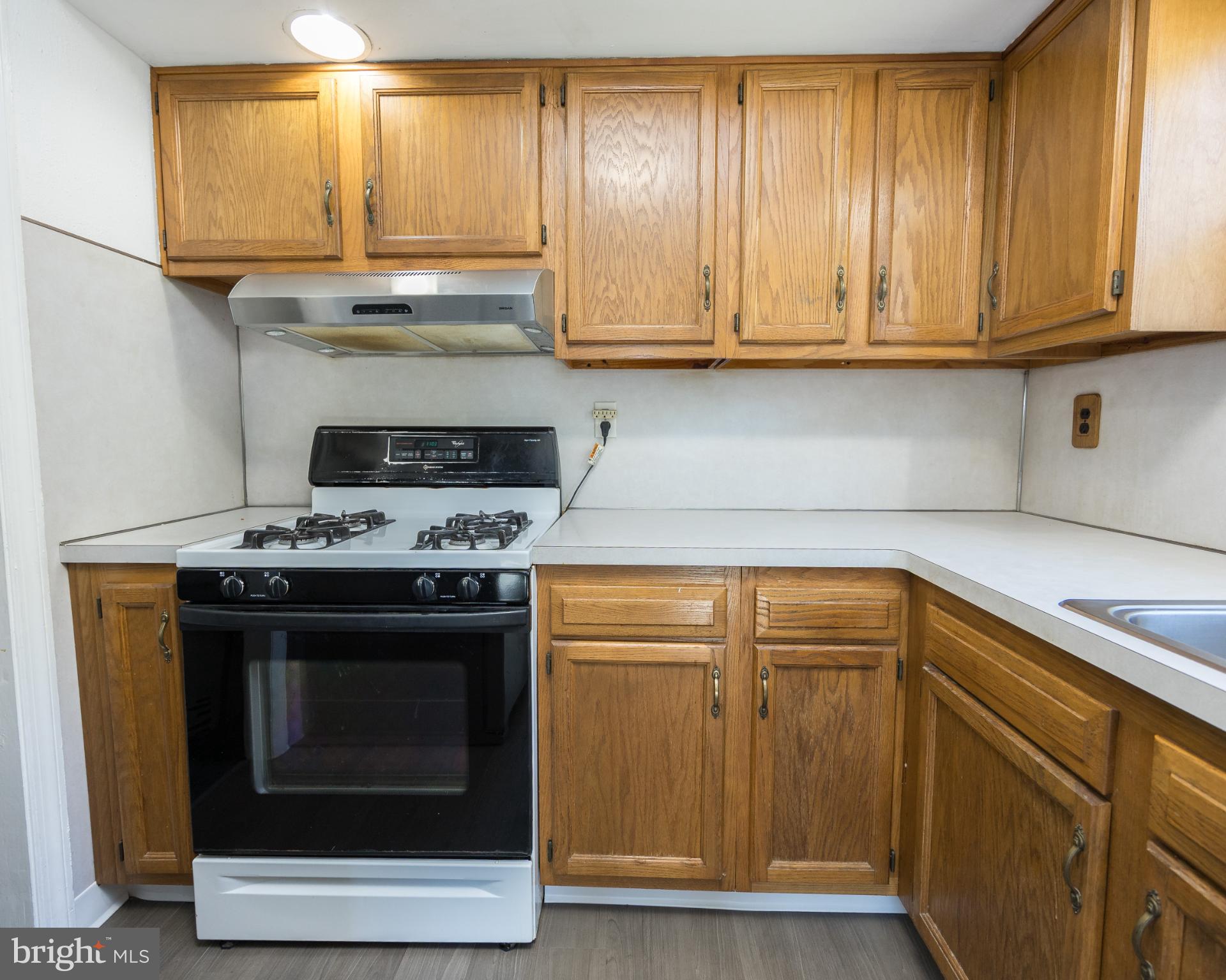 14 Lasalle Avenue New Castle, DE 19720 - Photo 11 of 23 a kitchen with granite countertop cabinets stainless steel appliances and a counter space