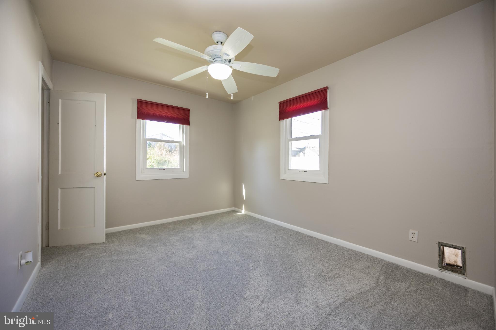 14 Lasalle Avenue New Castle, DE 19720 - Photo 9 of 23 an empty room with windows and fan