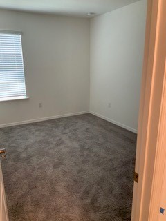 8166 97th Avenue Vero Beach, FL 32967 - Photo 9 of 11 an empty room with a window