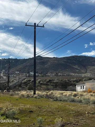 a view of a swimming pool with a mountain