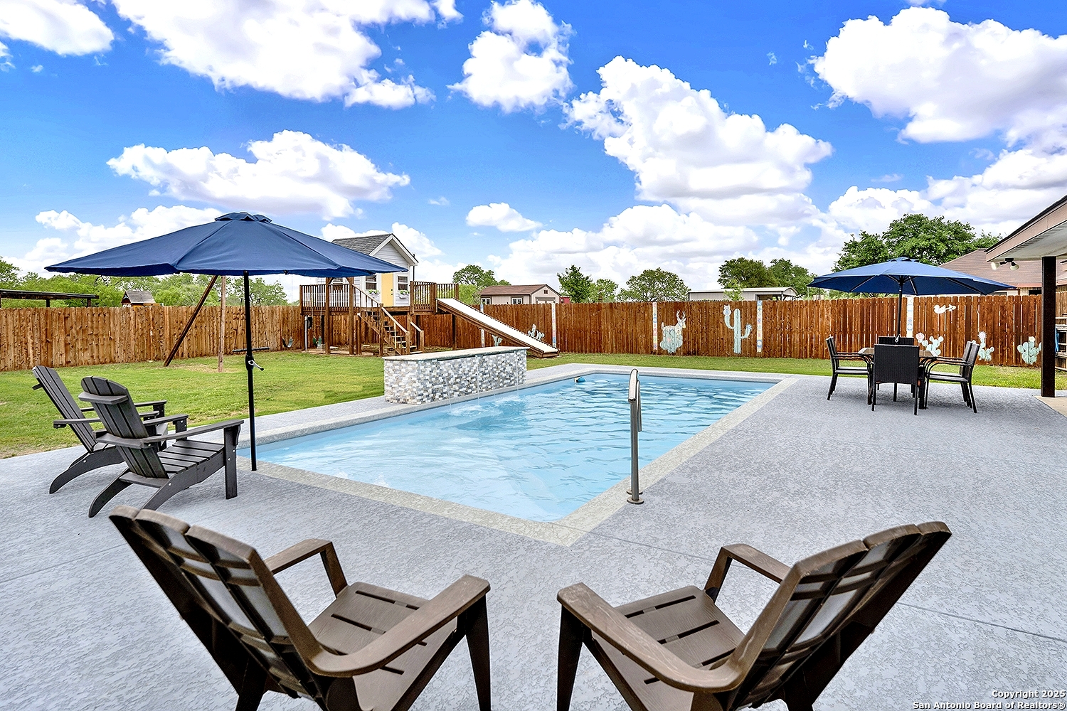 153 Plainview Drive Poth, TX 78147 - Photo 1 of 35 a view of a backyard with sitting area