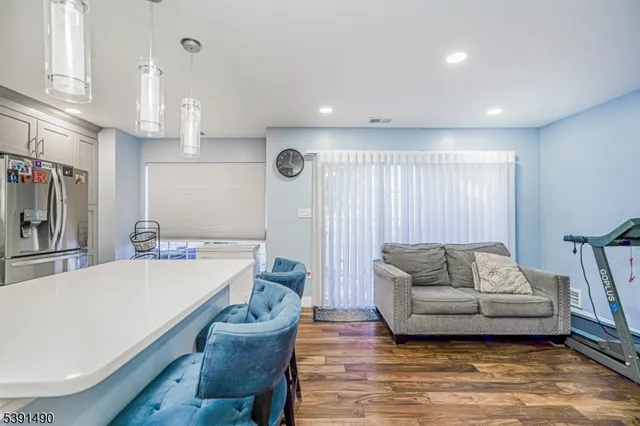 a living room with furniture and a table