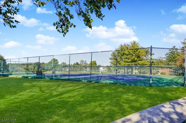 a view of a golf course with a lake