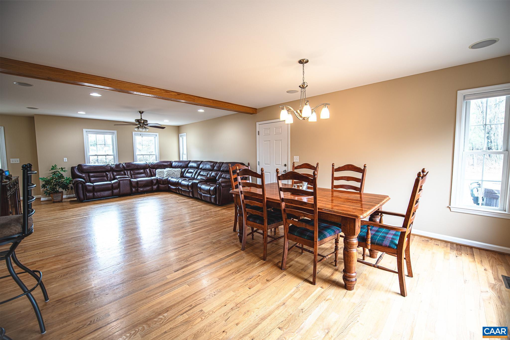 1101 Keith Road Stanardsville, VA 22973 - Photo 15 of 38 a view of a dining room with furniture window and wooden floor