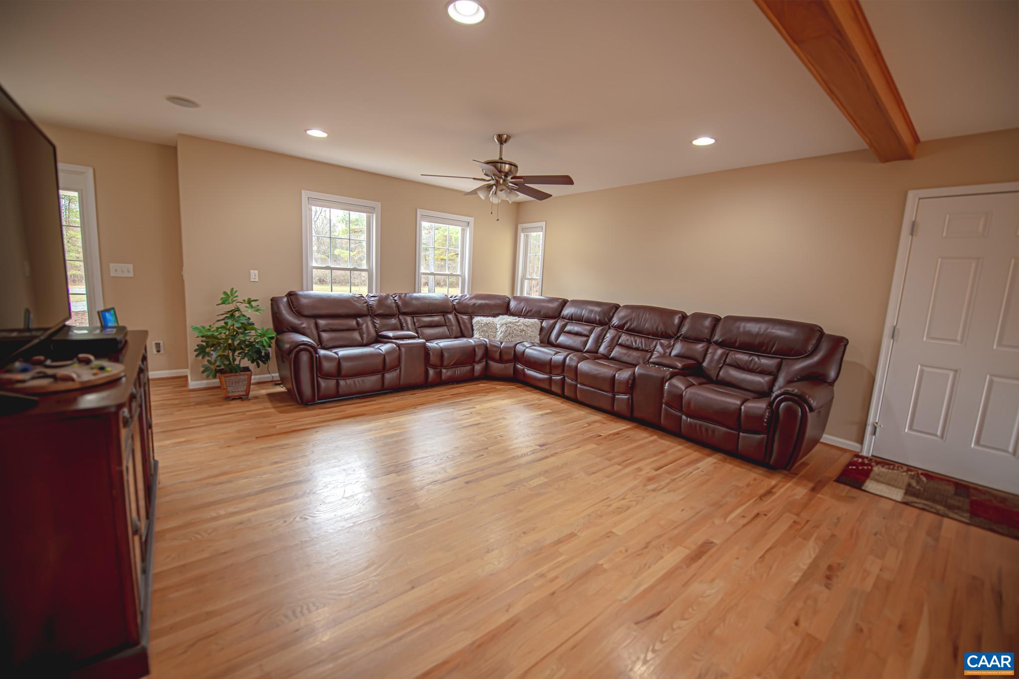 1101 Keith Road Stanardsville, VA 22973 - Photo 16 of 38 a living room with furniture and a large window