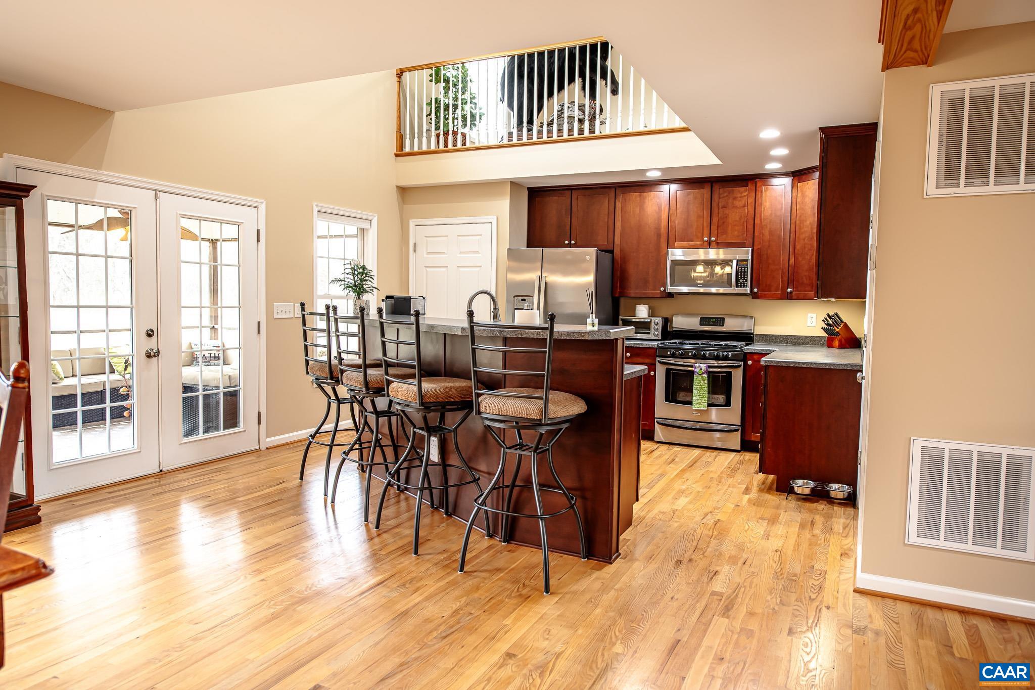 1101 Keith Road Stanardsville, VA 22973 - Photo 17 of 38 a view of a dining room with furniture and wooden floor