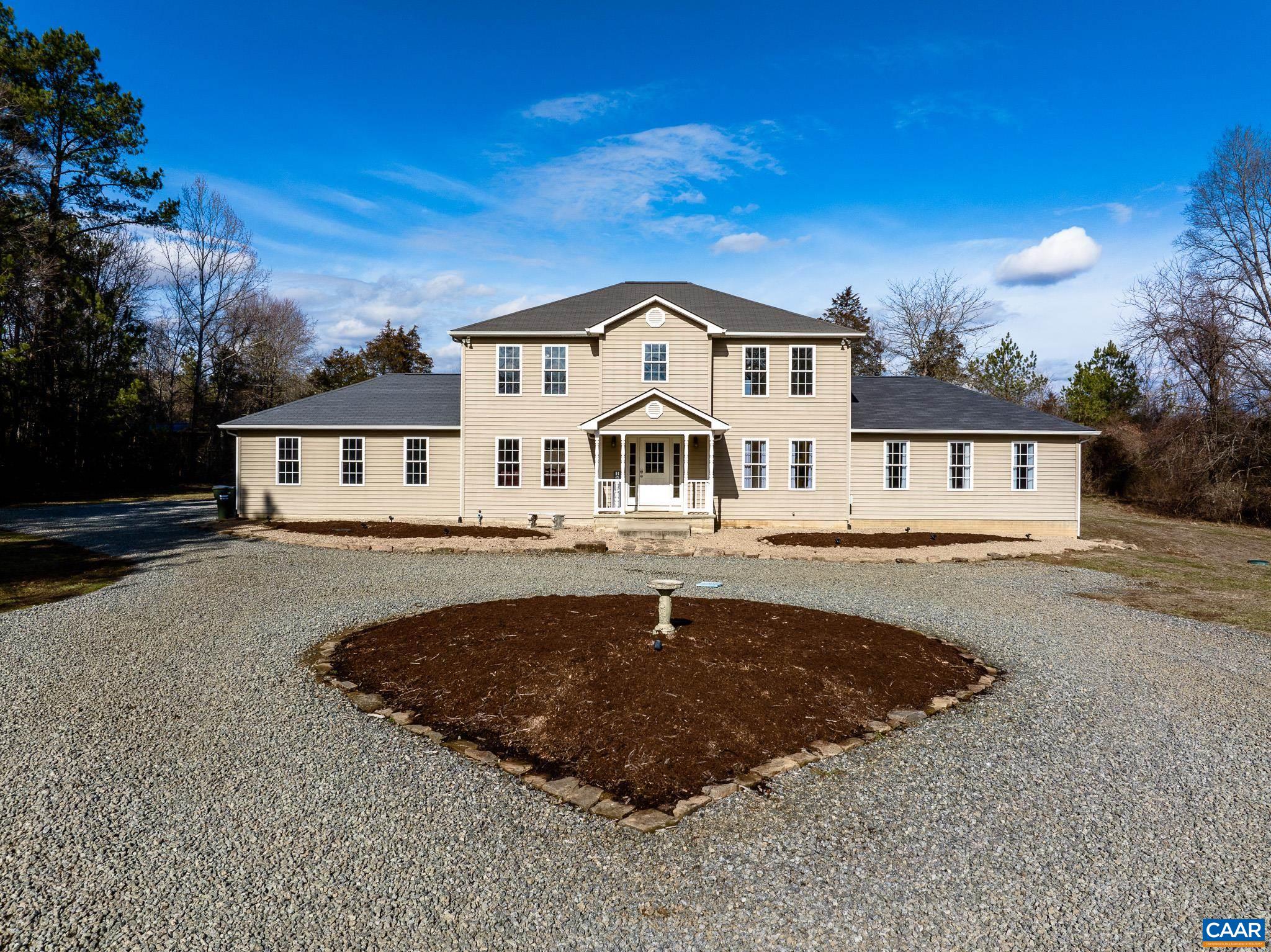 1101 Keith Road Stanardsville, VA 22973 - Photo 2 of 38 a front view of a house with a yard