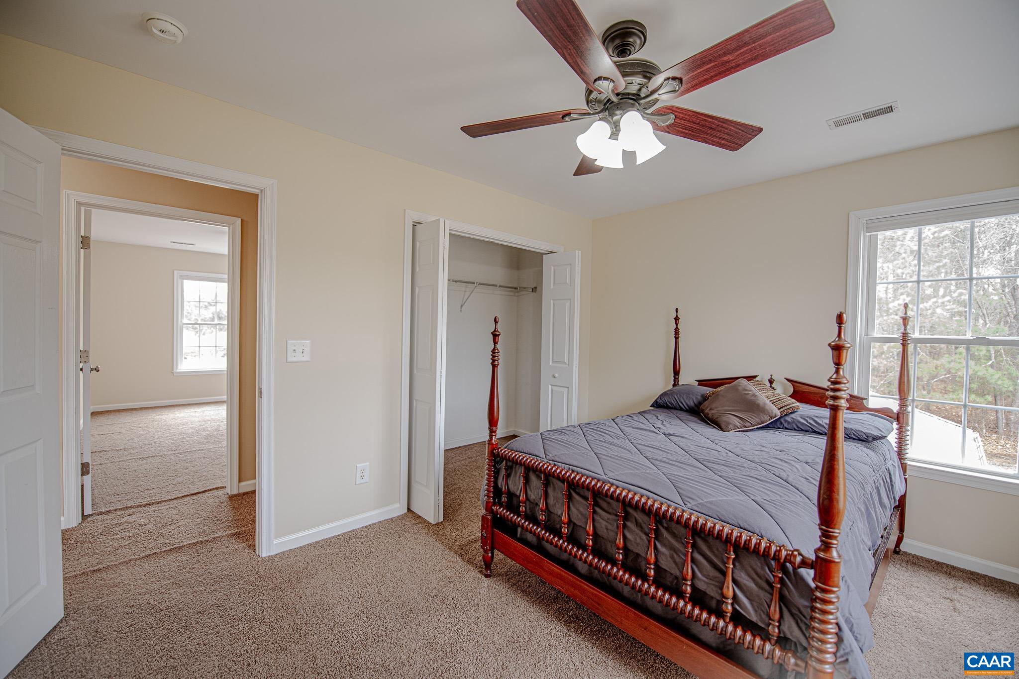 1101 Keith Road Stanardsville, VA 22973 - Photo 22 of 38 a bedroom with a bed and window