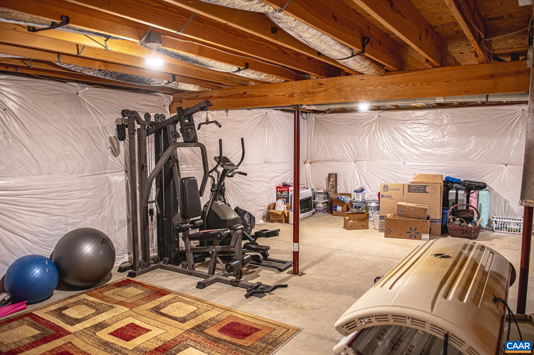 1101 Keith Road Stanardsville, VA 22973 - Photo 26 of 38 a view of a room with gym equipment