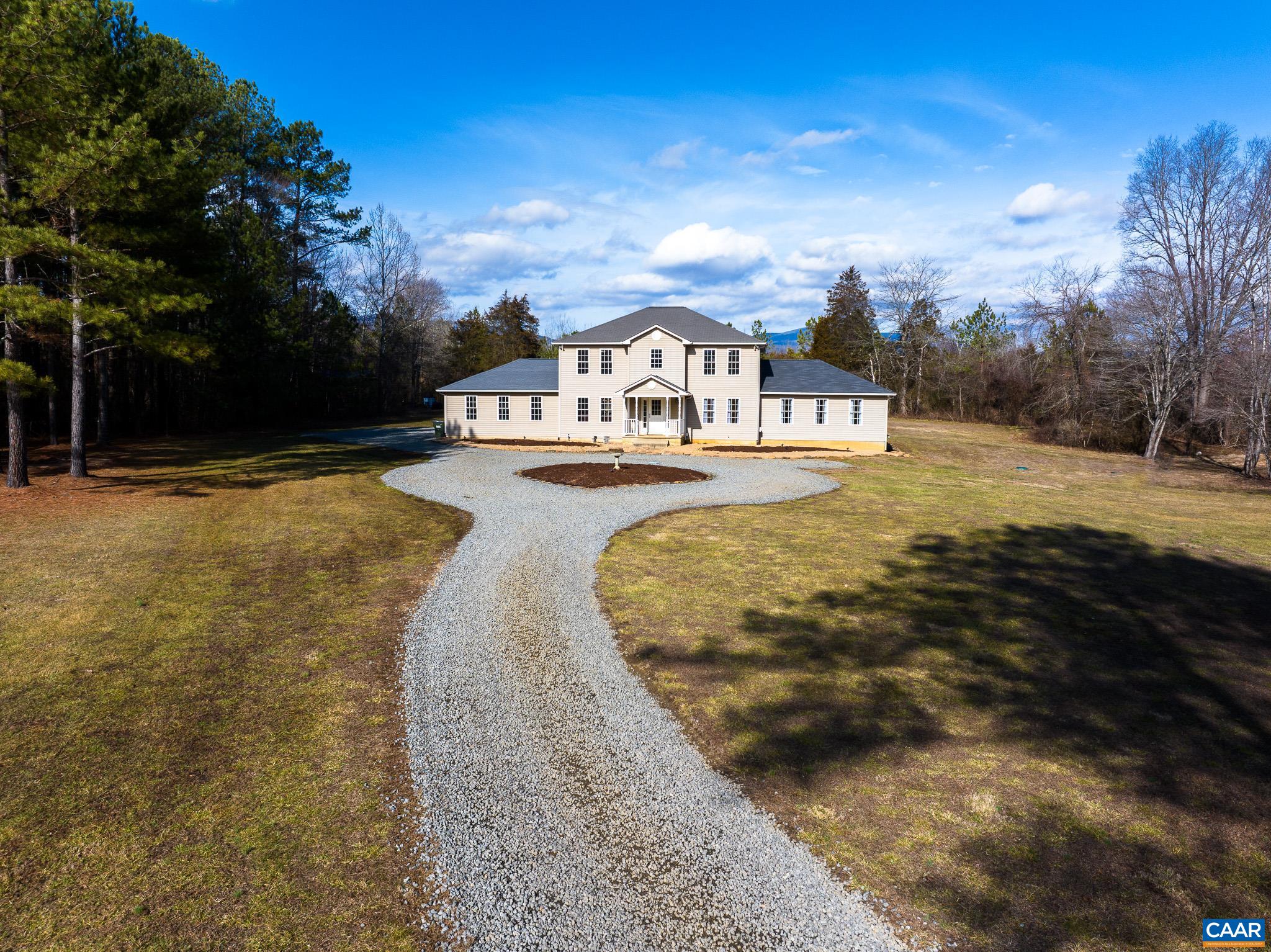 1101 Keith Road Stanardsville, VA 22973 - Photo 3 of 38 a view of a swimming pool with a yard