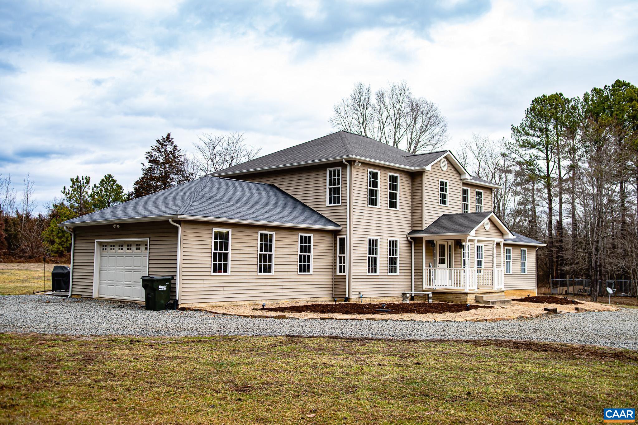 1101 Keith Road Stanardsville, VA 22973 - Photo 34 of 38 a front view of a house with a yard