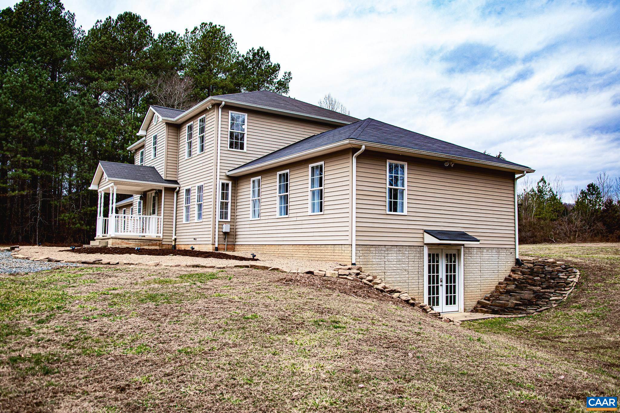 1101 Keith Road Stanardsville, VA 22973 - Photo 35 of 38 a view of a house with a yard
