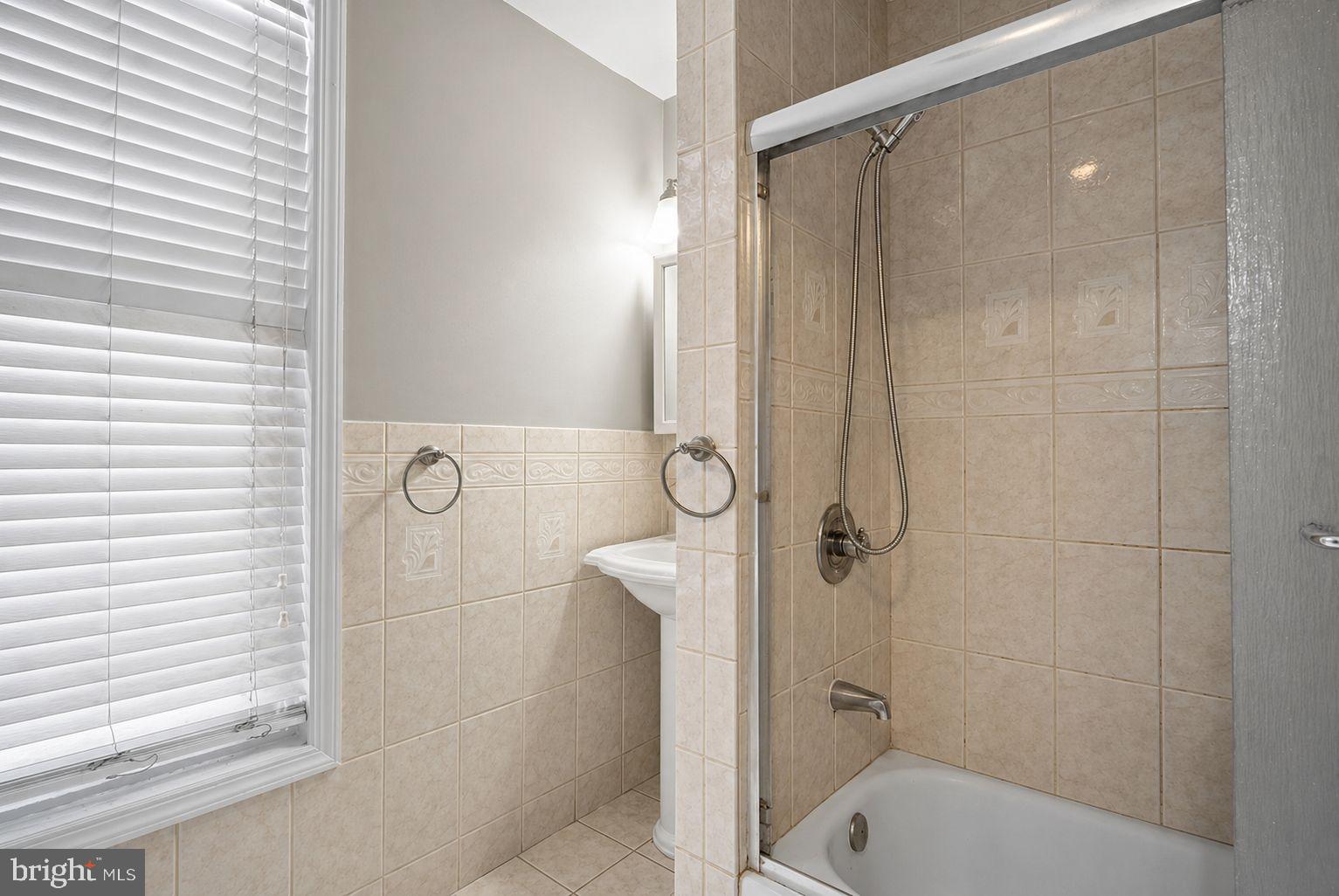 1936 North 7th Street, Unit 2 Philadelphia, PA 19122 - Photo 7 of 12 a bathroom with a shower