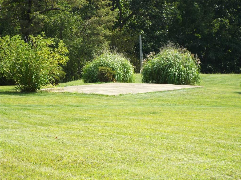 119 Fishpot Road Aliquippa, PA 15001 - Photo 23 of 24 Cement area that can be used for a pavilion, etc.
