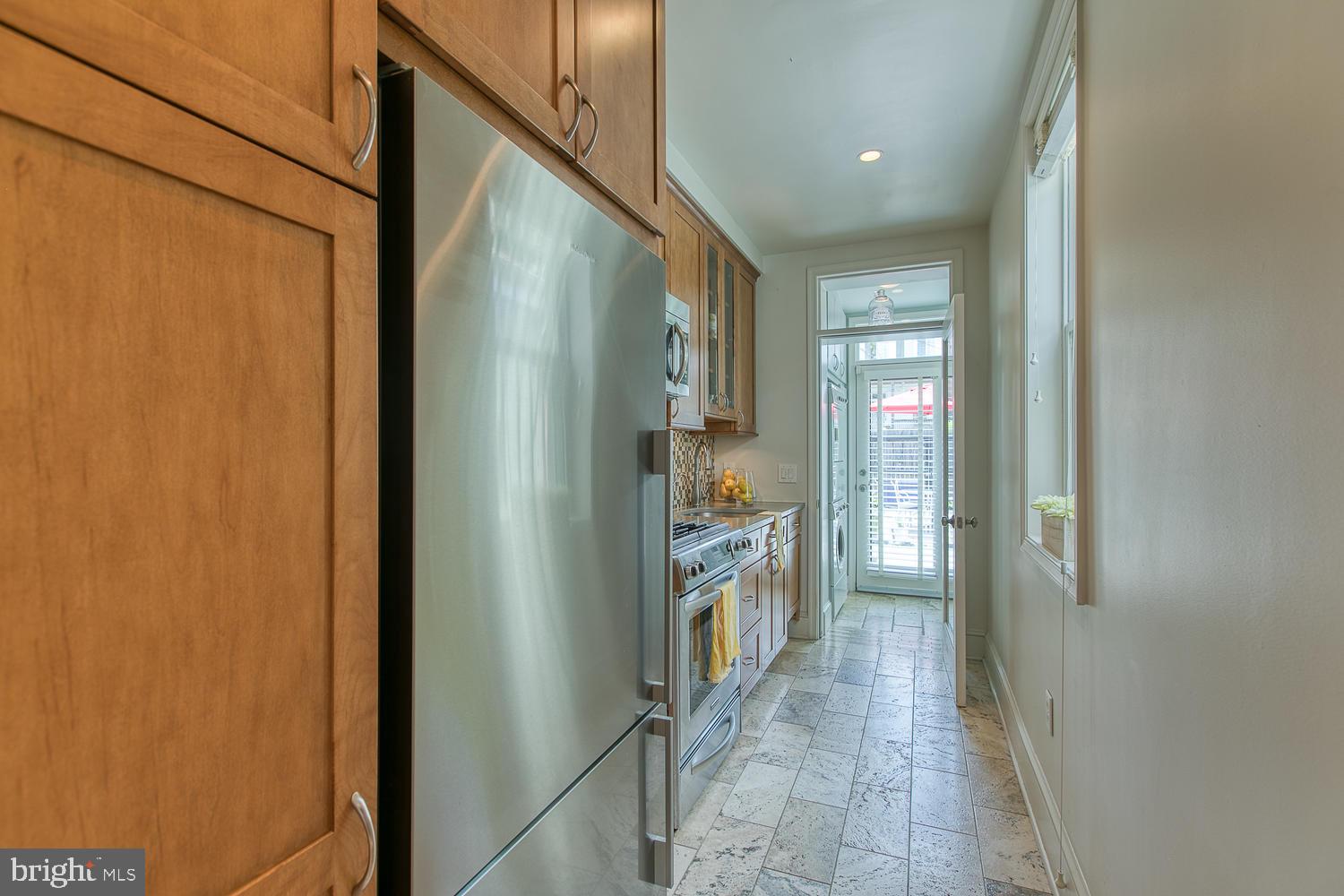 602 14th Place Northeast Washington, DC 20002 - Photo 14 of 40 Renovated kitchen opens to back patio!
