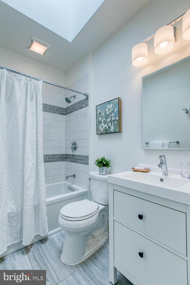 602 14th Place Northeast Washington, DC 20002 - Photo 28 of 40 Gorgeous renovated bath with skylight!