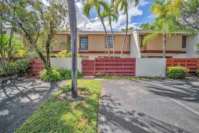 front view of a house with a street