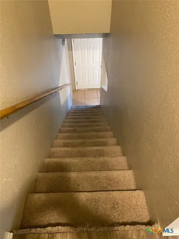 a bathroom with a sink and toilet