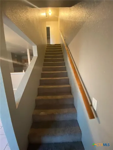 a bathroom with a toilet and a sink