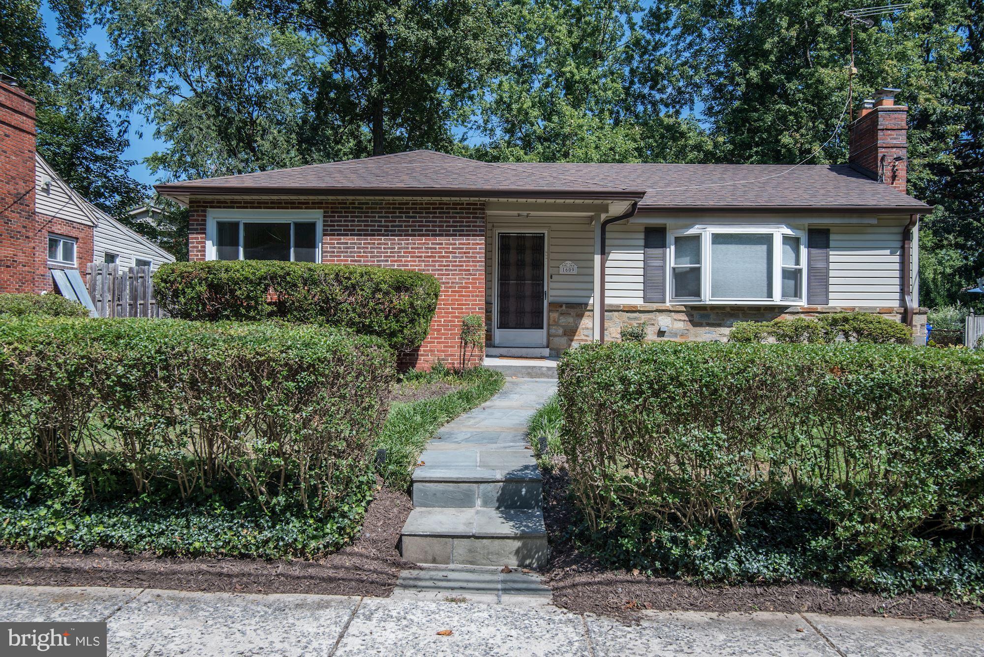 1609 Sanford Road Silver Spring, MD 20902 - Photo 2 of 38 Landscaped front yard with flagstone walkway.