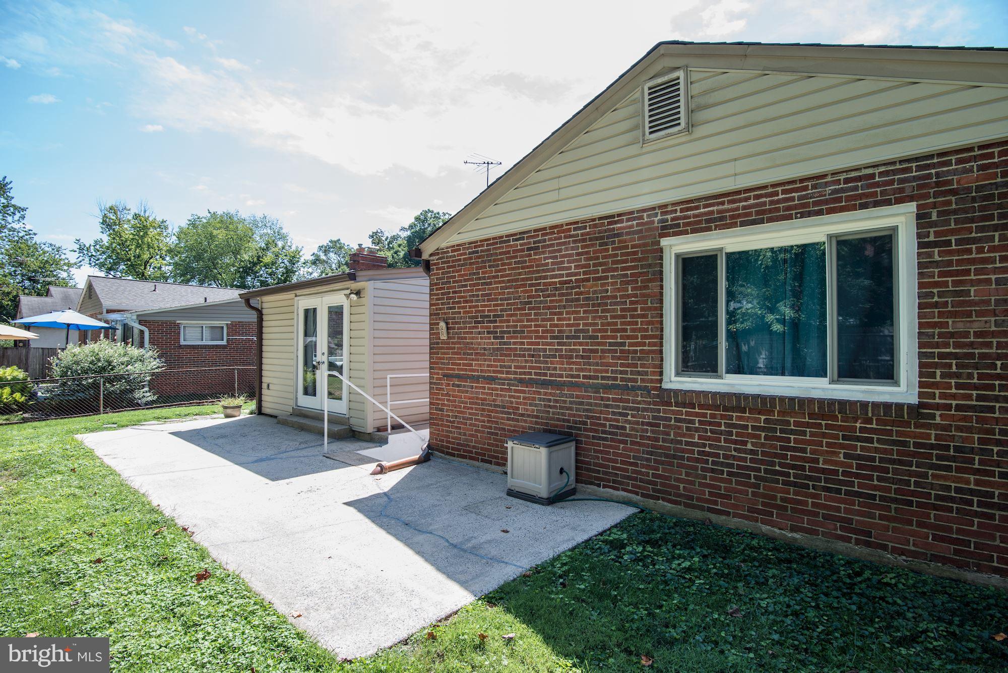 1609 Sanford Road Silver Spring, MD 20902 - Photo 36 of 38 Patio off of family room & rear basement walk out.