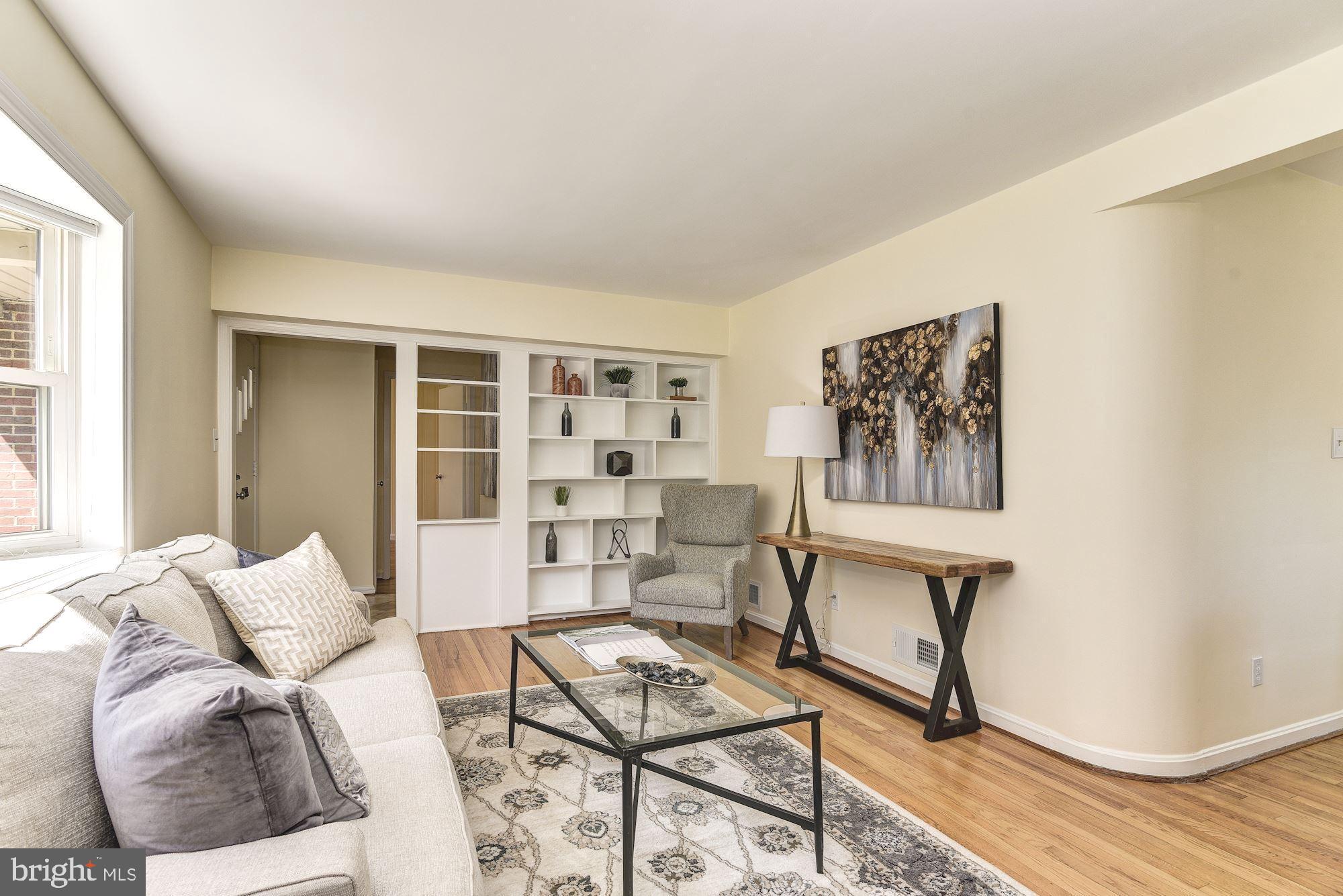 1609 Sanford Road Silver Spring, MD 20902 - Photo 7 of 38 Built in shelves & hardwood floors in living room.