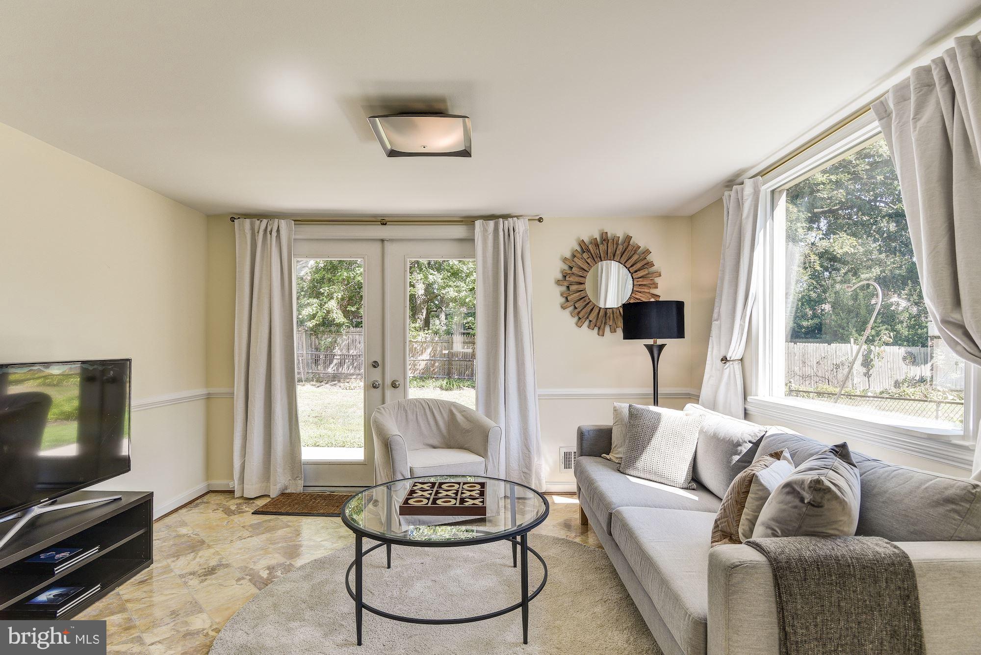 1609 Sanford Road Silver Spring, MD 20902 - Photo 9 of 38 Family room with french doors lead to patio.