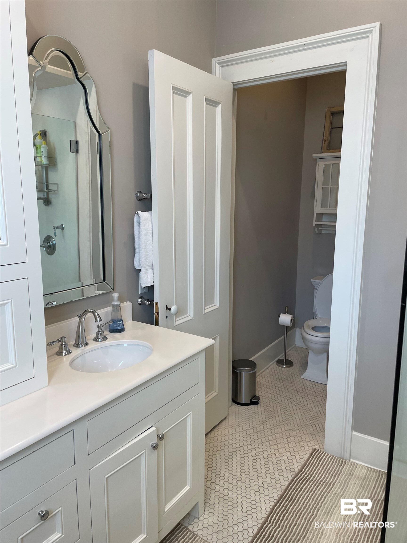 1001 Augusta Street Mobile, AL 36604 - Photo 20 of 26 Bathroom with toilet, vanity, and tile patterned flooring