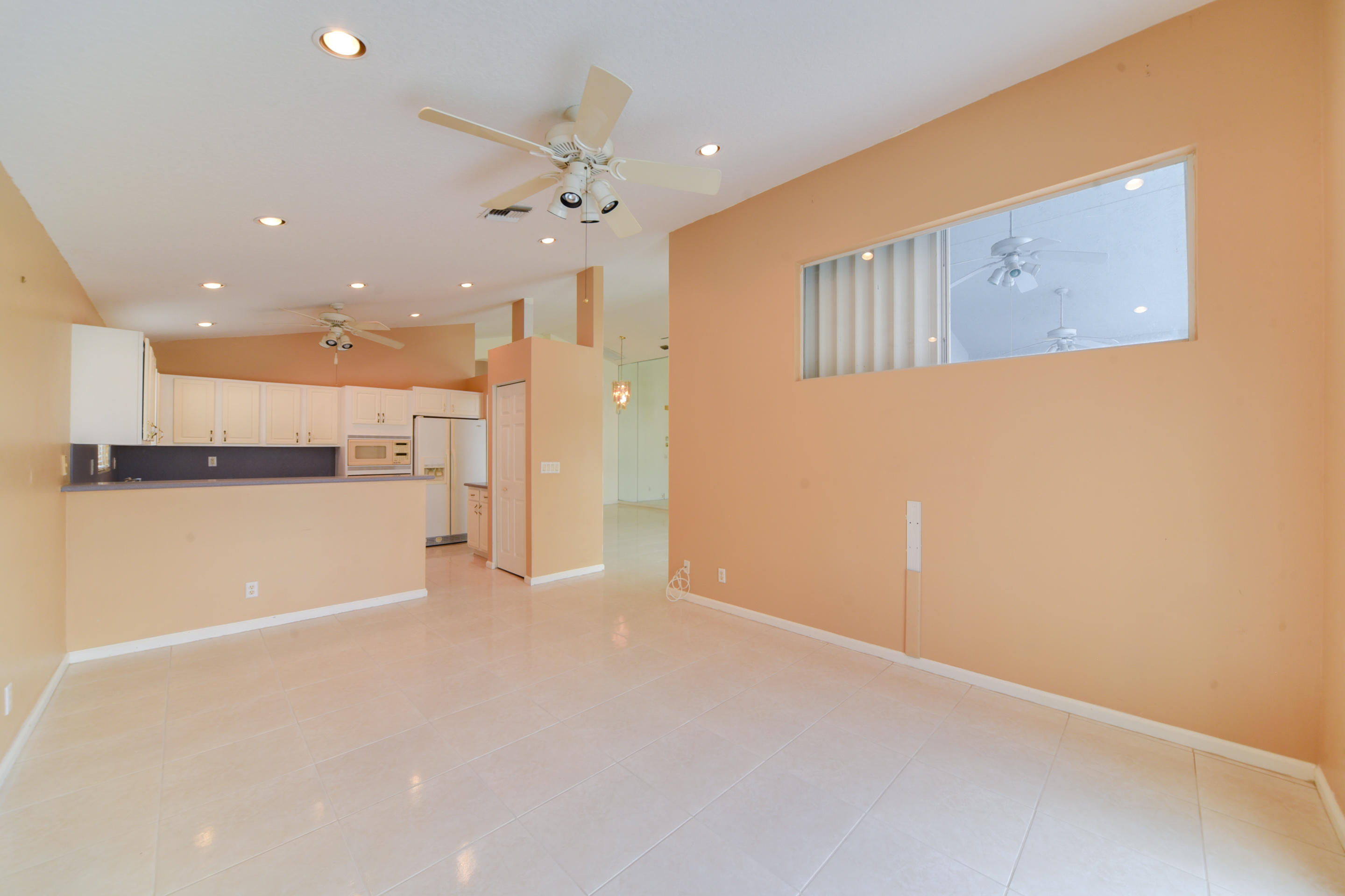 172 Cove Road Greenacres, FL 33413 - Photo 13 of 39 COVE FAMILY ROOM KITCHEN