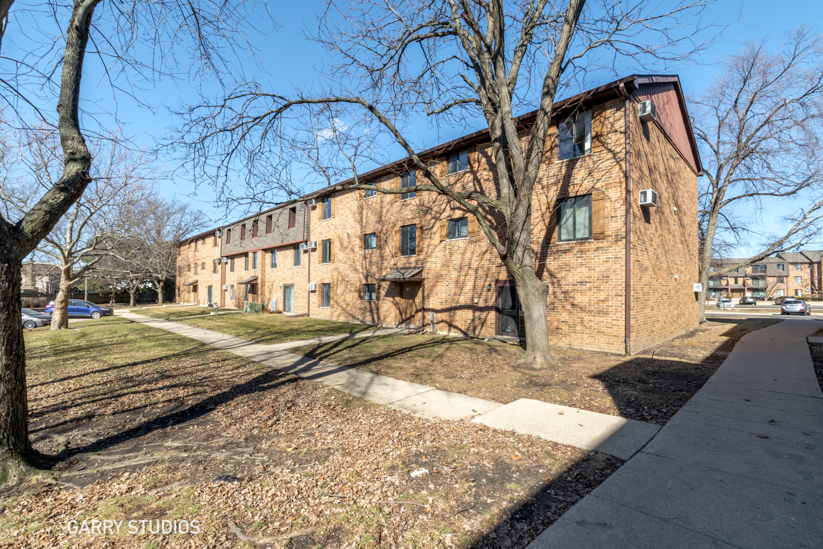 720 Briar Hill Lane, Unit 5 Addison, IL 60101 - Photo 14 of 14 a view of a yard with wooden fence