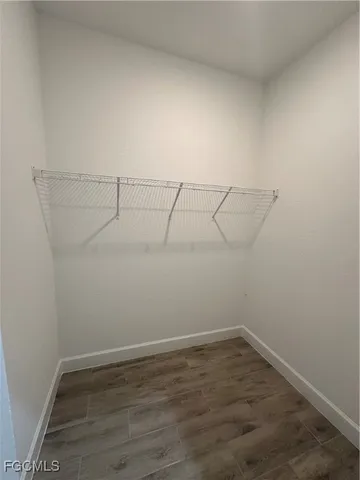 a view of a room with racks on the wall