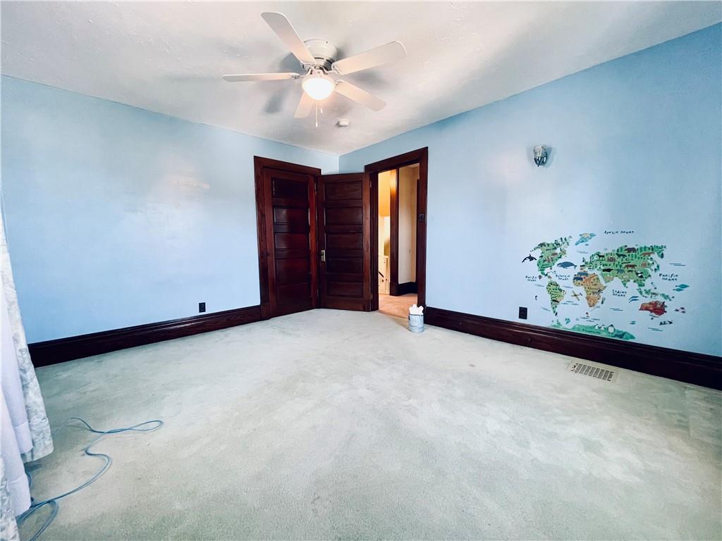119 East Coffee Street Uniontown, PA 15401 - Photo 20 of 25 a view of an empty room with a window