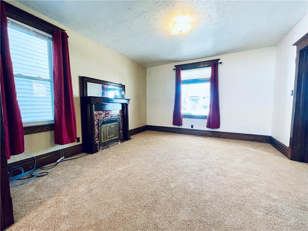 119 East Coffee Street Uniontown, PA 15401 - Photo 8 of 25 an empty room with windows