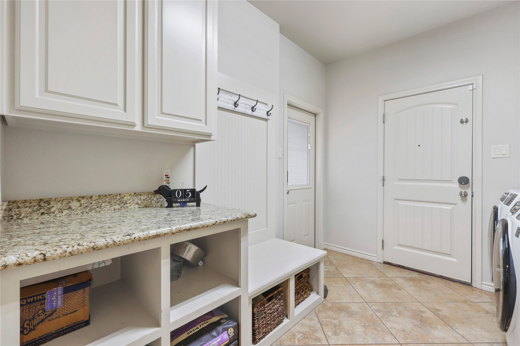 3801 Harvey Road College Station, TX 77845 - Photo 18 of 29 a kitchen with granite countertop a sink and cabinets