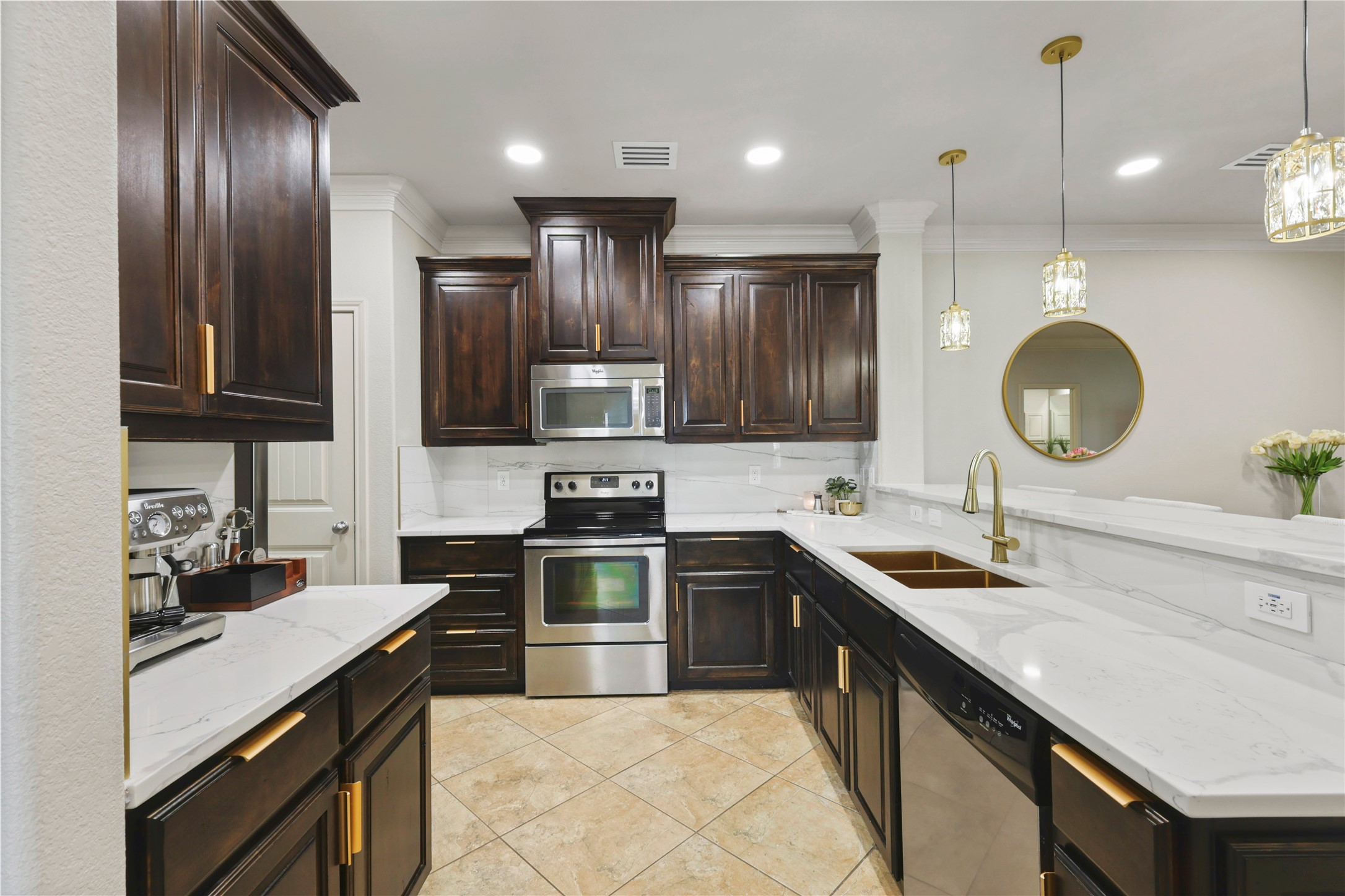 3801 Harvey Road College Station, TX 77845 - Photo 5 of 29 a kitchen with stainless steel appliances granite countertop a sink a stove top oven and refrigerator