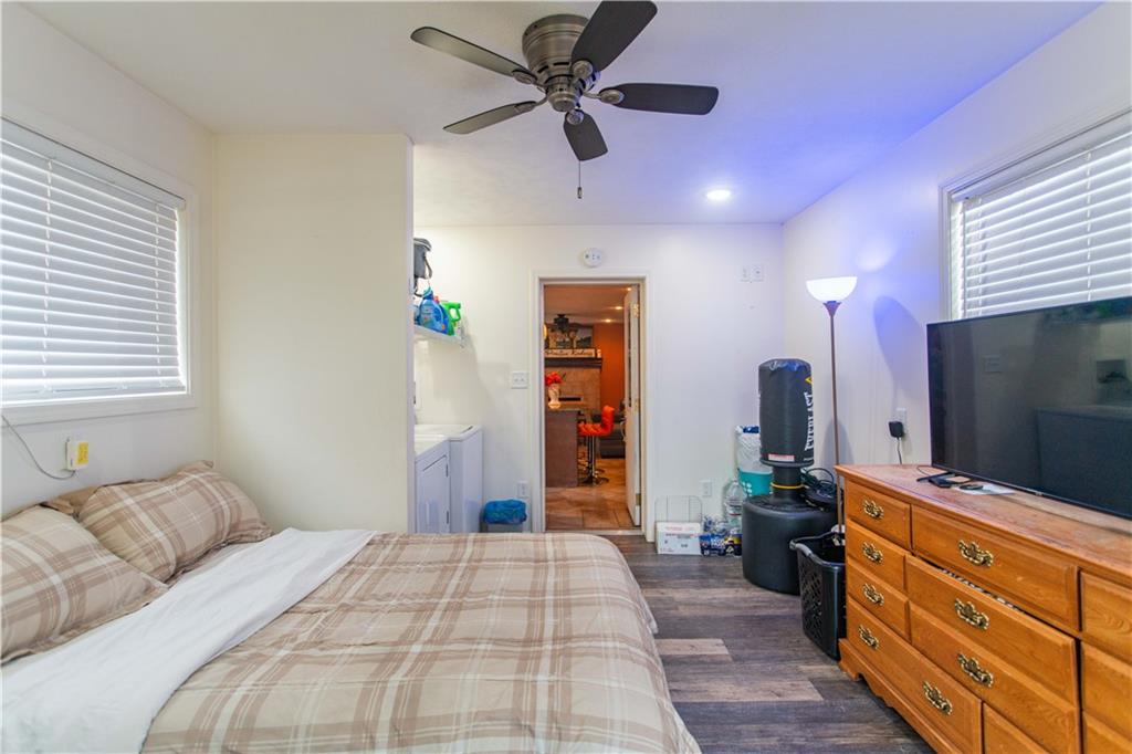 1530 6th Avenue Freedom, PA 15042 - Photo 18 of 33 a bedroom with a bed and a flat screen tv