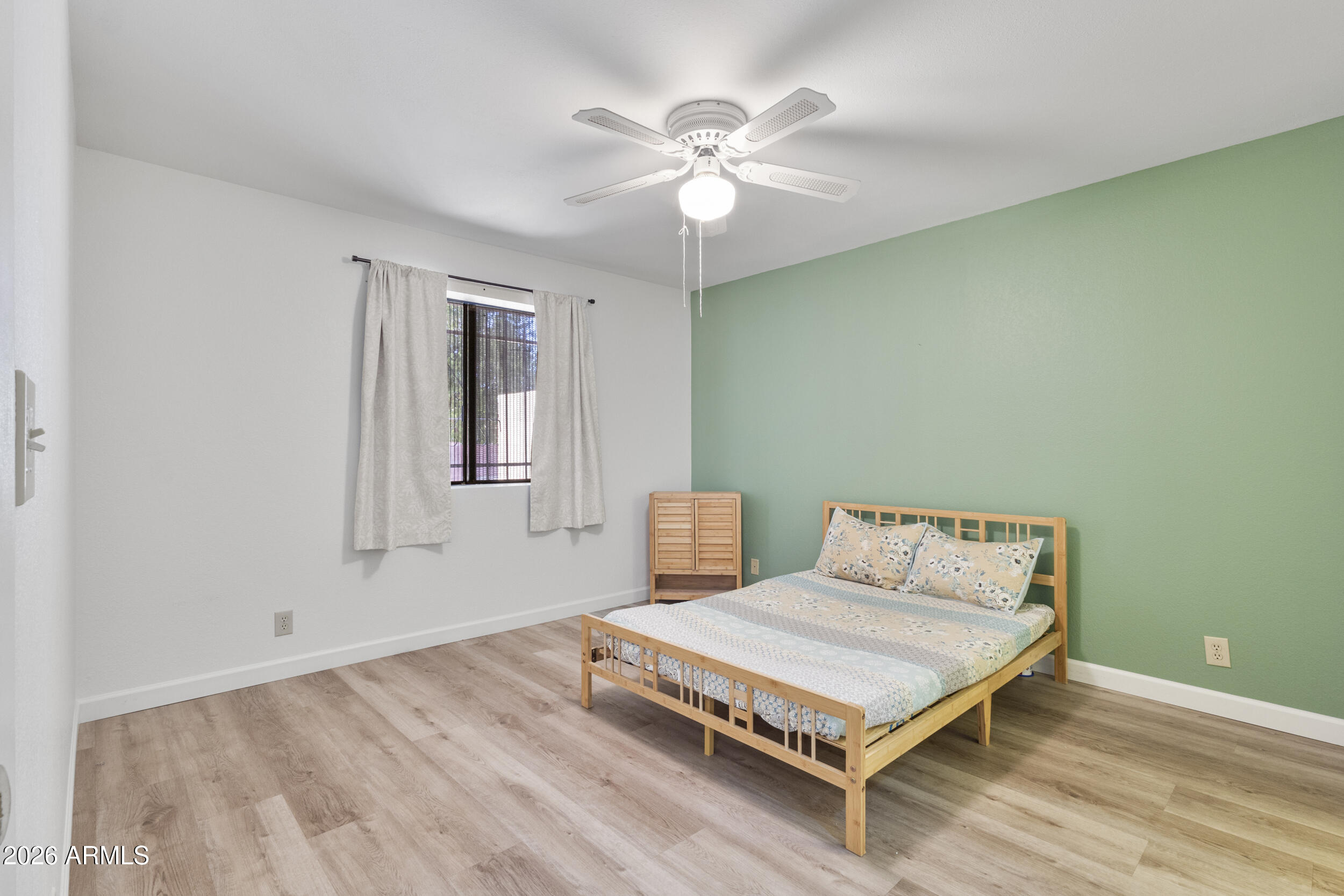 520 South Greenfield Road, Unit 39 Mesa, AZ 85206 - Photo 16 of 27 a room with a bed and window