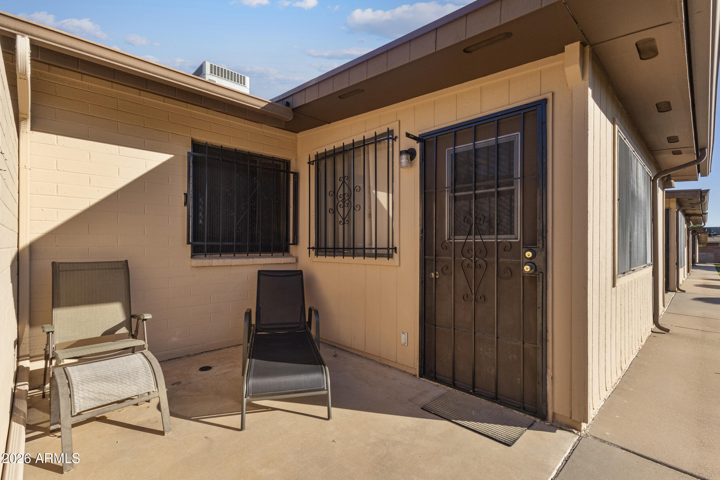 520 South Greenfield Road, Unit 39 Mesa, AZ 85206 - Photo 22 of 27 a view of a house with parking space and windows