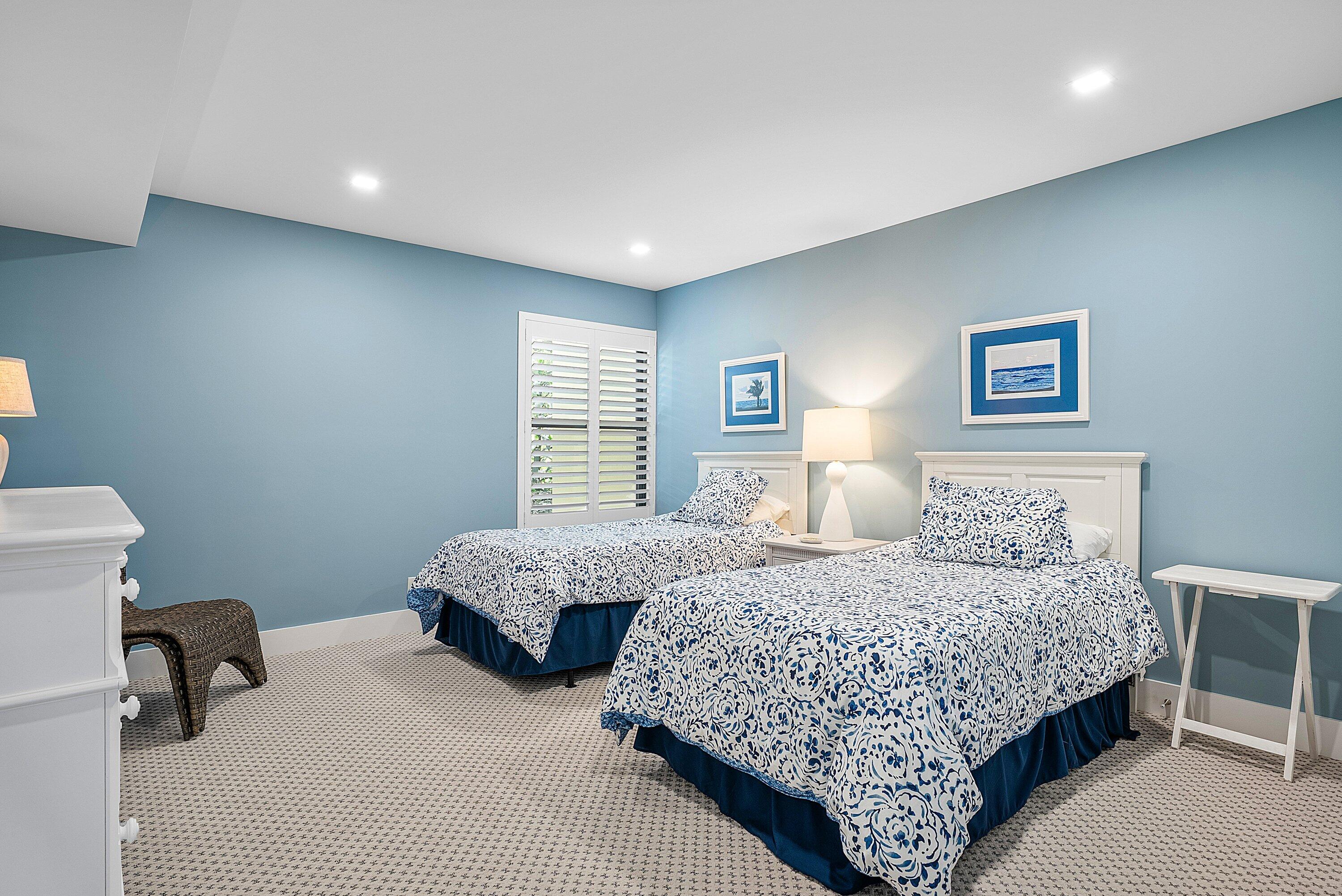 3709 North Quail Ridge Drive, Unit BOBWHITE B Boynton Beach, FL 33436 - Photo 22 of 51 a bedroom with a bed and a couch