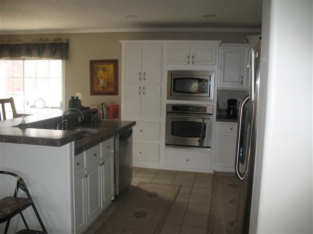 300 Edenway Road Dover, TN 37058 - Photo 12 of 20 Lots of Nice white cabinetry, nice work island.