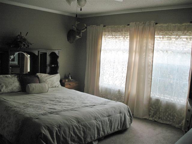 300 Edenway Road Dover, TN 37058 - Photo 16 of 20 Master Bedoom offers Master bath with Jacuzzi tub, separate shower, double sink vanities and walk in closet.