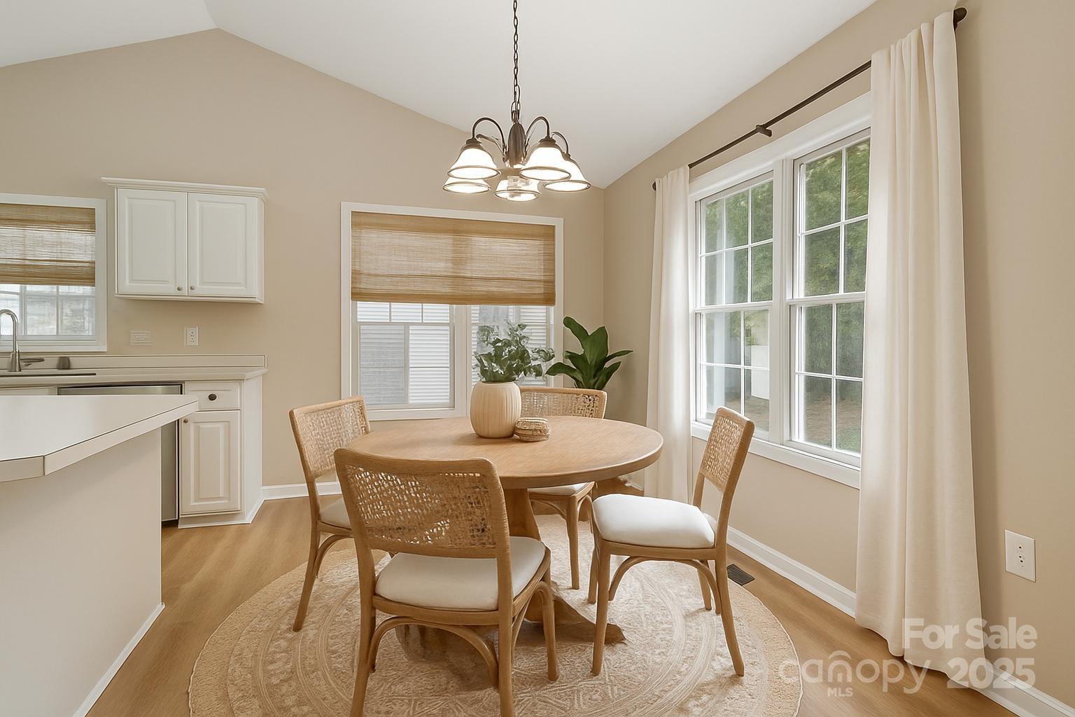 103 Wellspring Drive Fort Mill, SC 29715 - Photo 11 of 36 a view of a dining room with furniture window and outside view